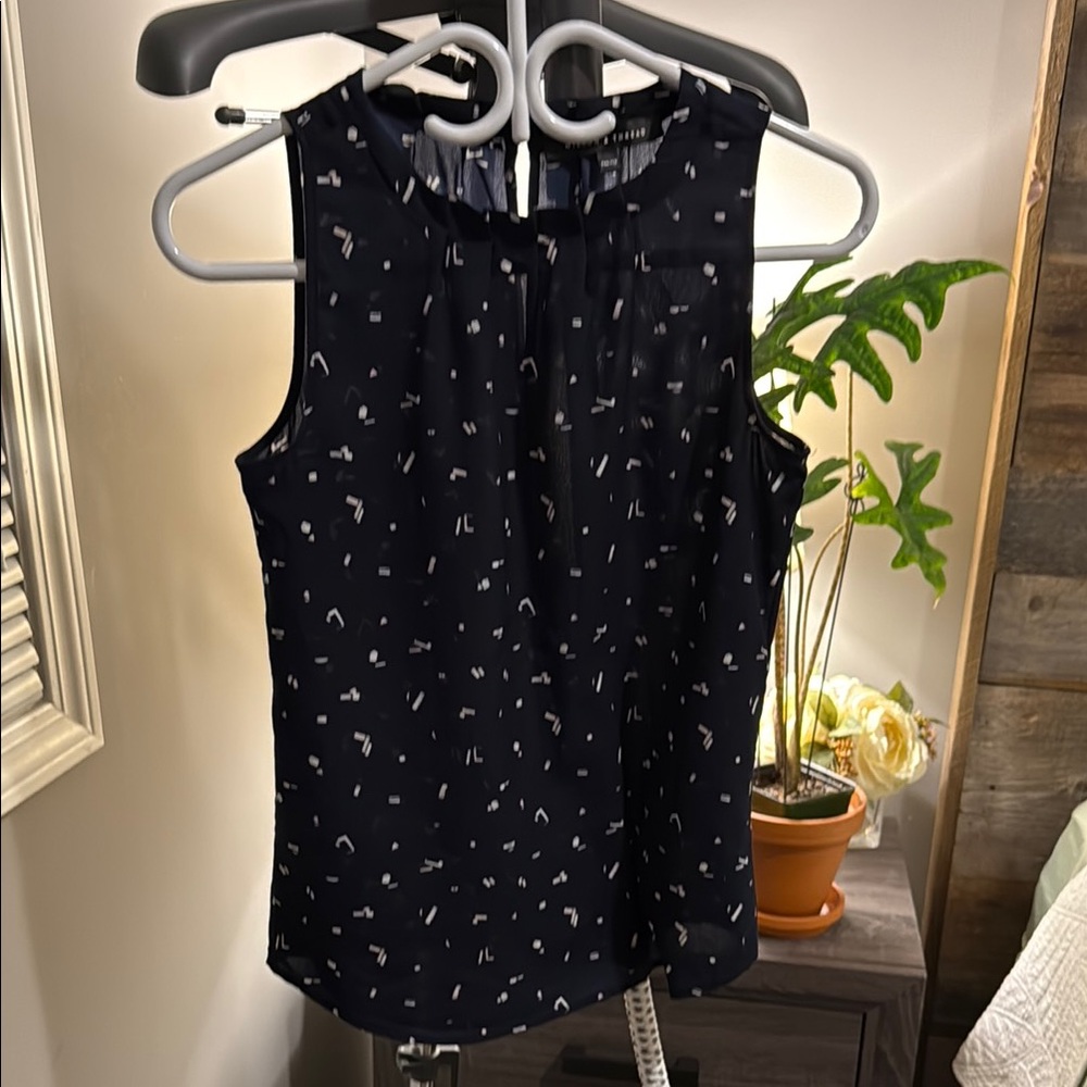 White and Blue Sleeveless Blouse